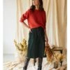 Milou Organic Cotton Corduroy Midi Skirt -Woolovers e6dcc milou cord skirt green lifestyle